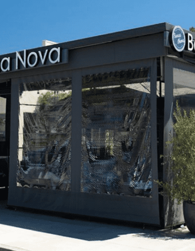 A restaurant with a sign that says basa nova.