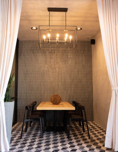 A dining room with a checkered floor.