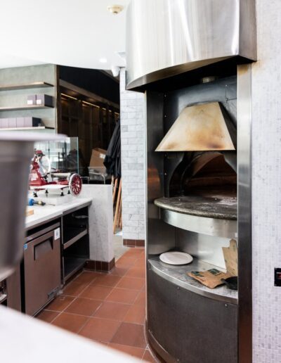 A pizza oven in a kitchen.